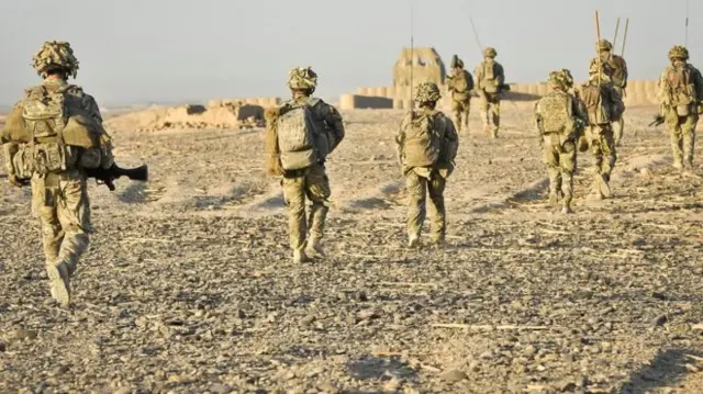 Soldiers on patrol in the desert