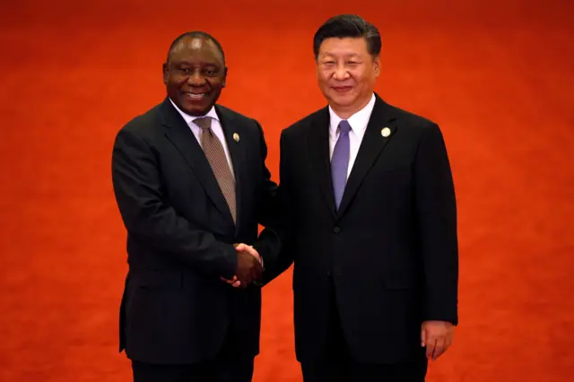 South African President Cyril Ramaphosa, left, shakes hands with Chinese President Xi Jinping during the Forum on China-Africa Cooperation held at the Great Hall of the People on September 3, 2018