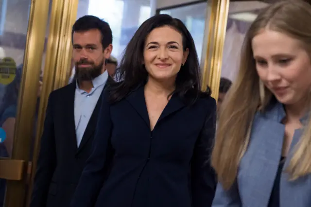 Jack Dorsey (left) and Sheryl Sandberg prepare to give evidence