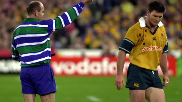 A rugby union international being sent to the sin bin