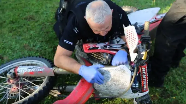 Police with off-road motorbike