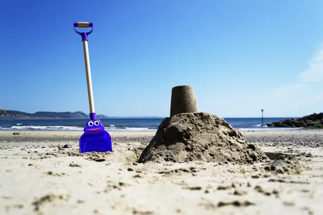 A sandcastle on a beach