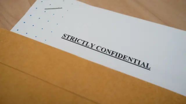 A document marked: Strictly confiential