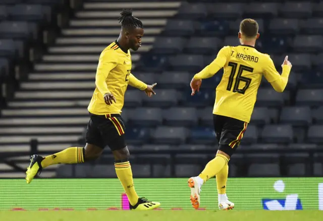 Michy Batshuayi (left) celebrates scoring