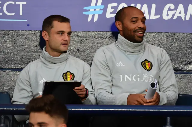 Belgium assistants Shaun Maloney and Thierry Henry in the Belgium dugout