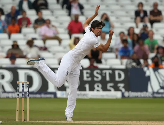 Cook bowling