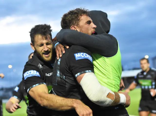 Glasgow Warriors players celebrate