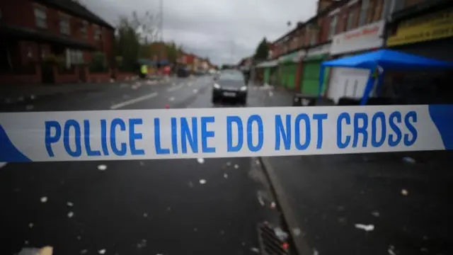 Police tape on road