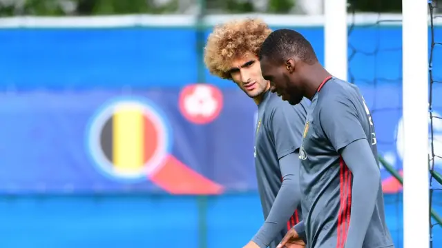 Belgium's Marouane Fellaini and Christian Benteke