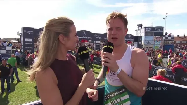 Olly Murs speaking to Gabby Logan after completing the Great North Run