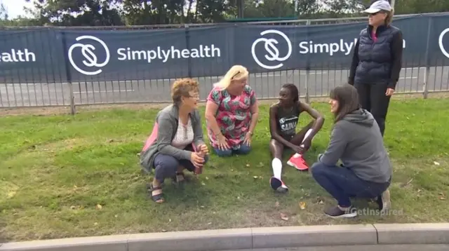 Community helping runner