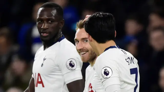 Eriksen celebrating