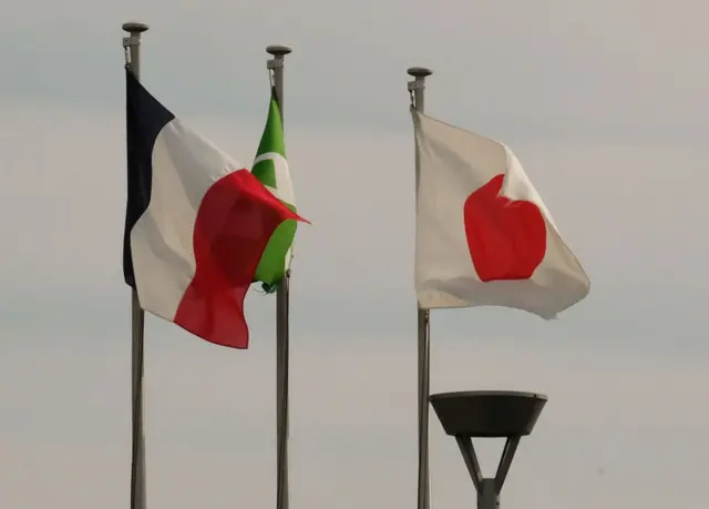 The national flags of France and Japan displayed at Nissan Motor's Oppama