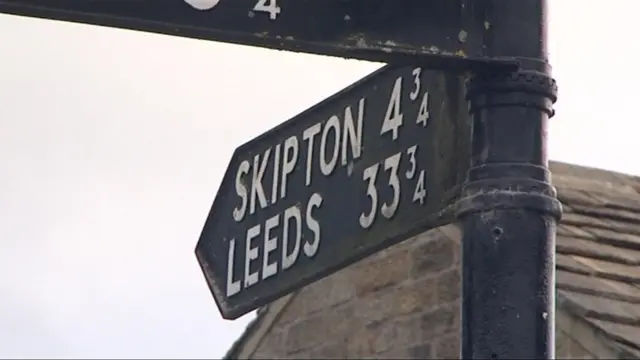 A sign on the canal