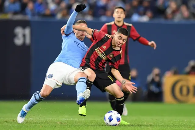 New York City FC defender Ben Sweat and Atlanta United midfielder Miguel Almiron