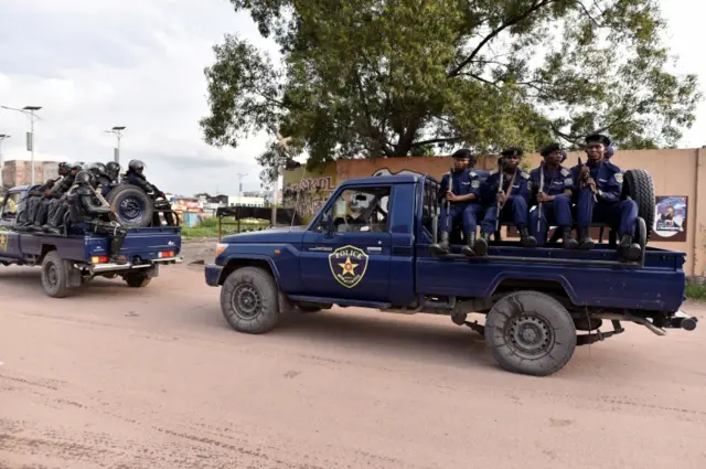 Congolese riot policemen patrol near the Union for Democracy and Social Progress (UDPS) party headquarters in Kinshasa, Democratic Republic of Congo, January 9, 2019.