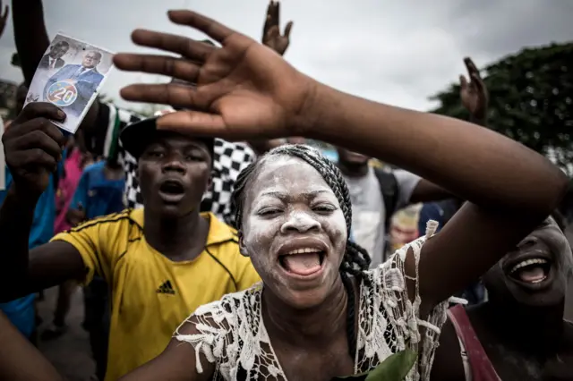 A supporter of the newly elected president of the Democratic Republic of Congo, Felix Tshisekedi, celebrates in the streets of Kinshasa on January 10, 2019