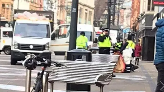 Street team removing tents