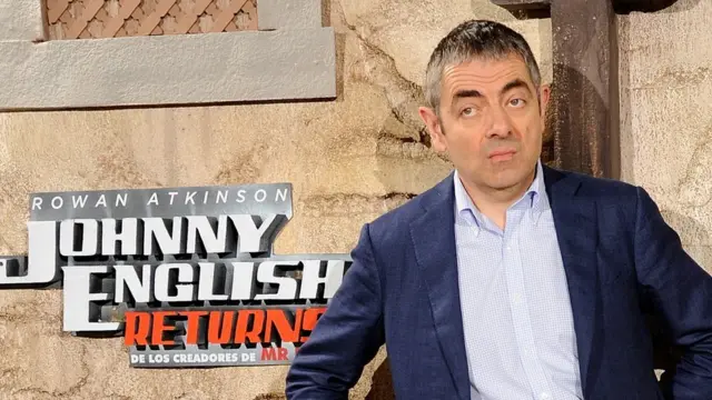 Rowan Atkinson as Johnny English