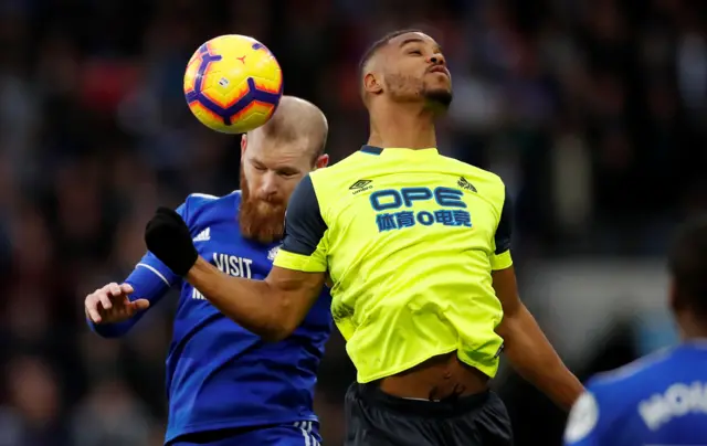 Cardiff City"s Aron Gunnarsson in action with Huddersfield Town"s Steve Mounie