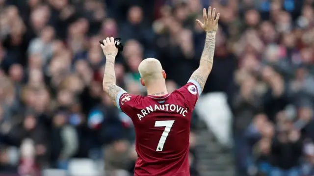 Marko Arnautovic waves to the crowd after being substituted