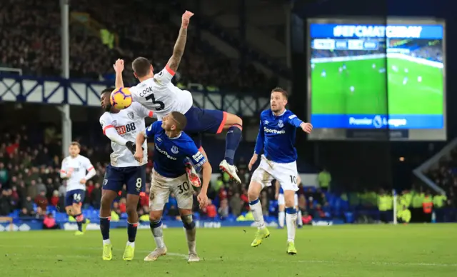 Richarlison fouls Steve Cook