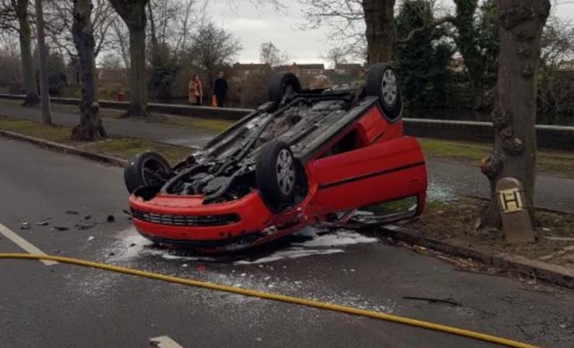 Overturned Corsa