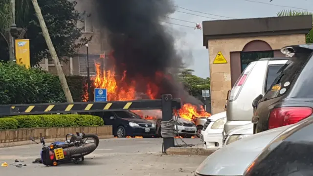 Burning cars in the Westands area of Nairobi