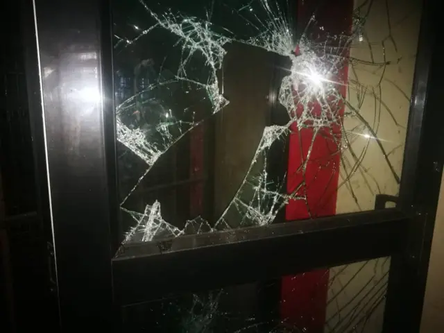 A smashed window pane at the MDC's offices in Harare