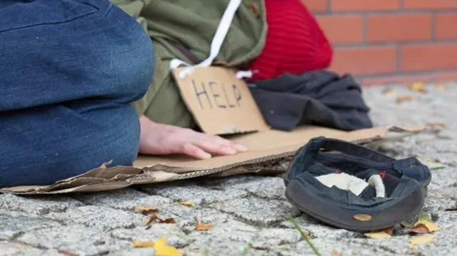 Homeless person asking for help