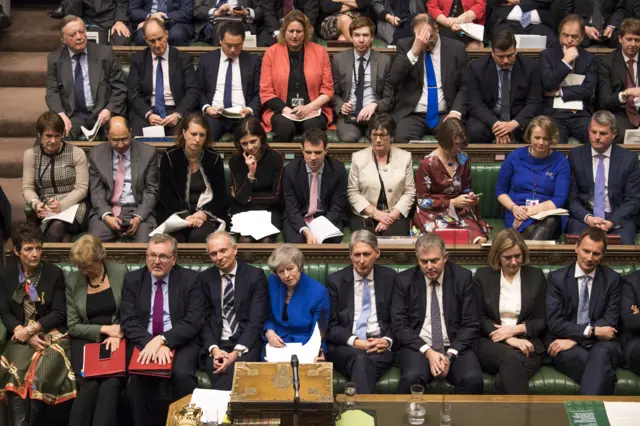 Theresa May and the Conservative benches