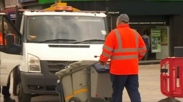 Council workers dealing with rubbish in Hull city centre