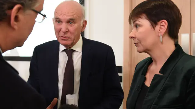 Sir Vince Cable and Caroline Lucas