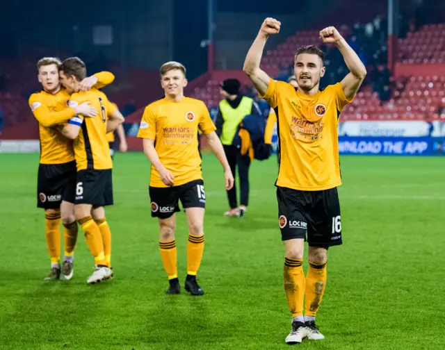 Stranraer players celebrate their 1-1 draw with Aberdeen