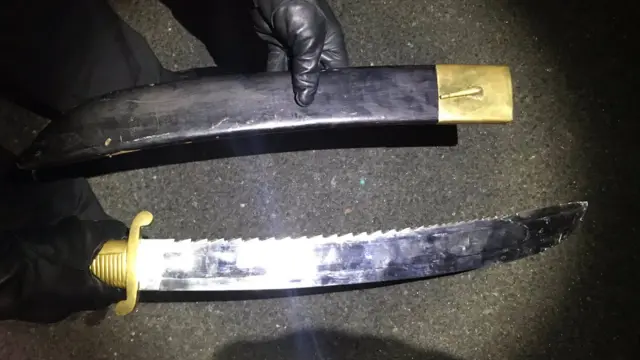 The serrated sword police say they found