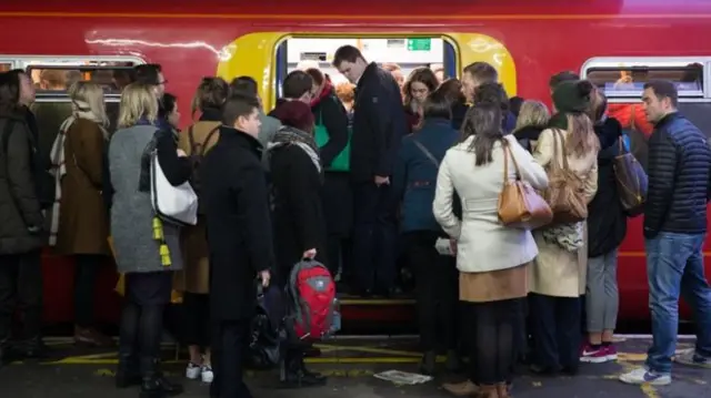 Passengers getting onto train