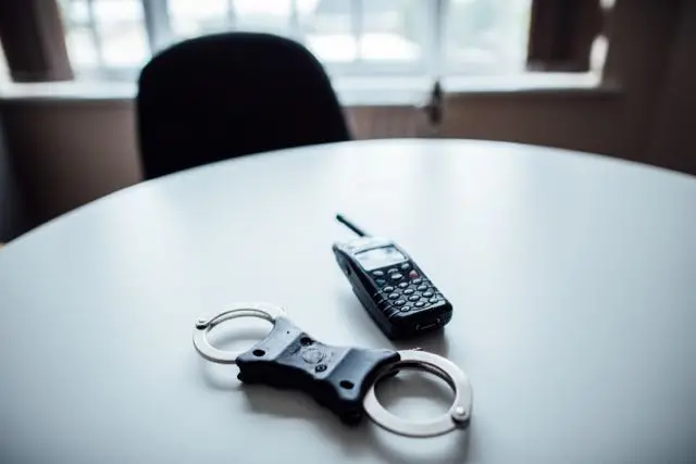 Cuffs and radio stock image