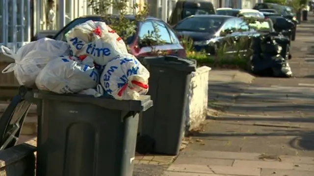 Bins piled high