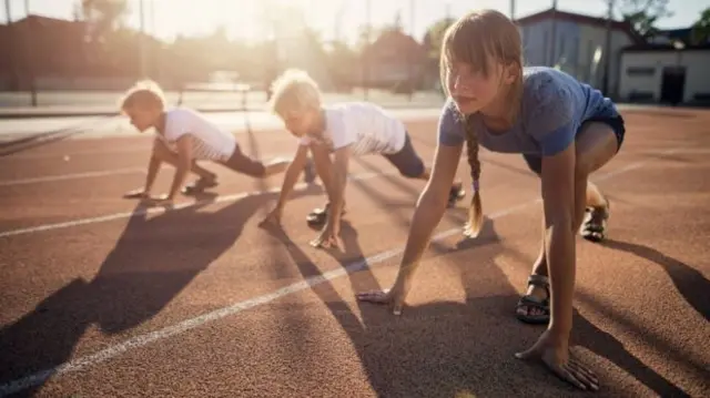 Children on running track