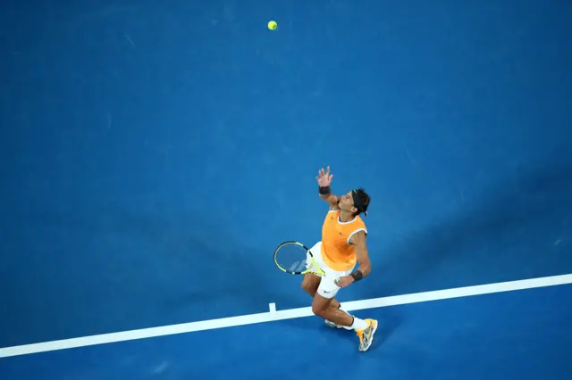 Nadal serves an ace