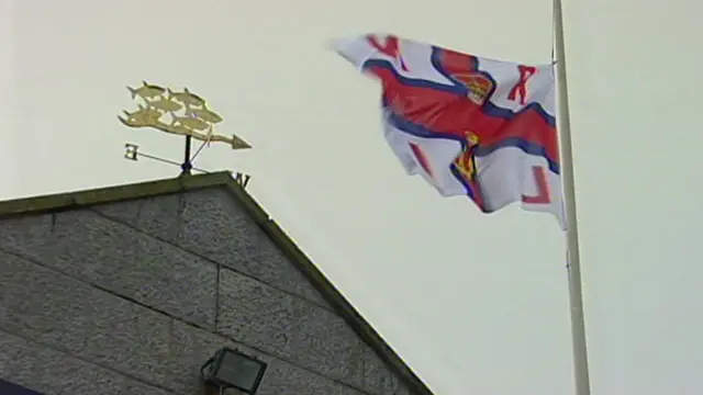 RNLI flag at half-mast