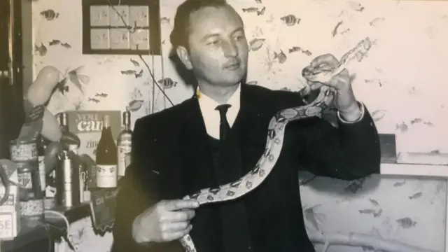 Dennis Hurt with a snake at Victoria Hotel in Beeston