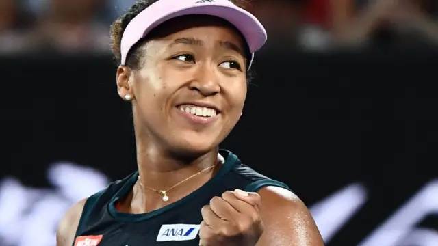 Naomi Osaka celebrates beating Karolina Pliskova