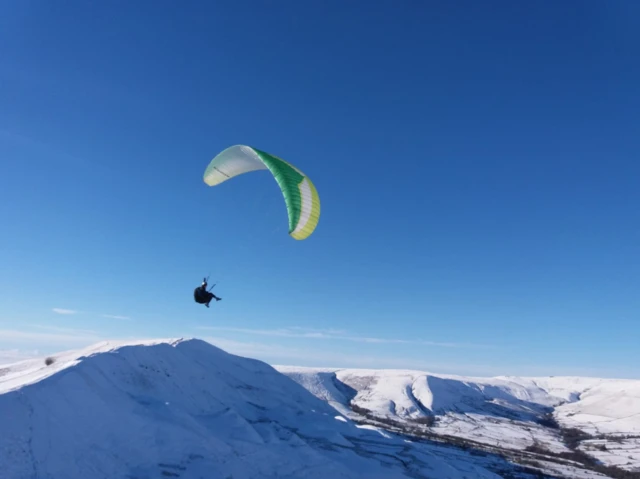 Paragliding over snow