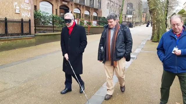 Peter Soulsby wearing a blindfold