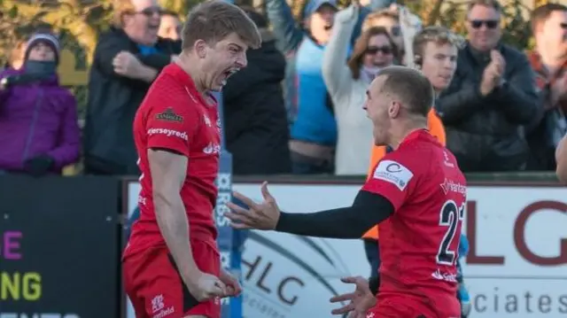 Auguy Slowik celebrates scoring against London Irish