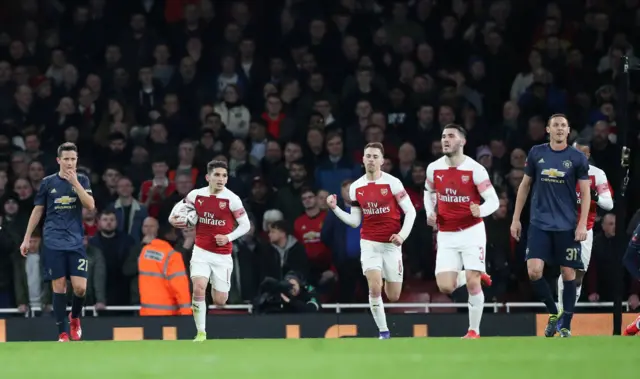 Arsenal players celebrate