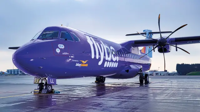 A blue Islands plane in Flybe livery