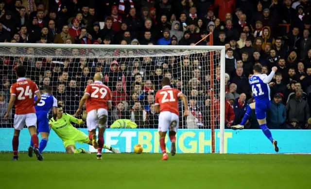 Joe Garner's penalty is saved by Costel Pantilimon