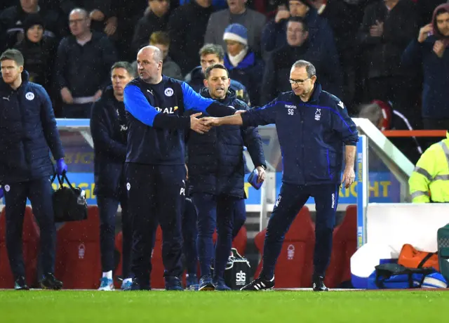 Martin O'Neill shakes hands with opposite number Paul Cook